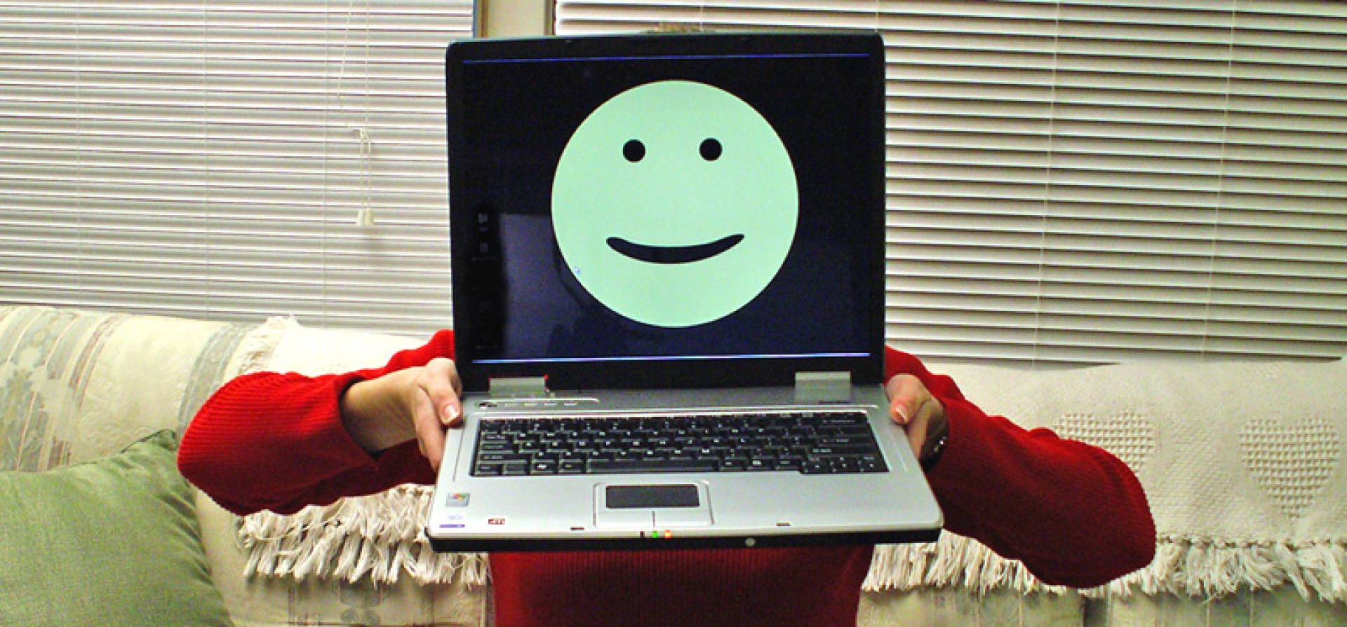 Laptop with a smiley face